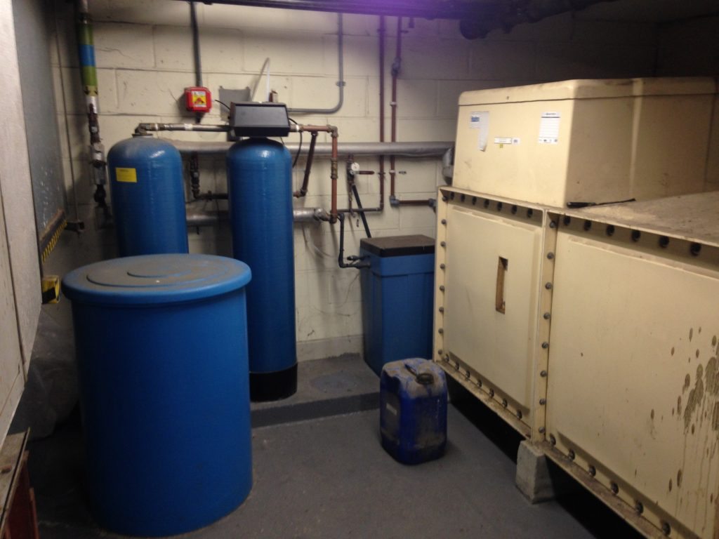 Image showing a large blue water softener system