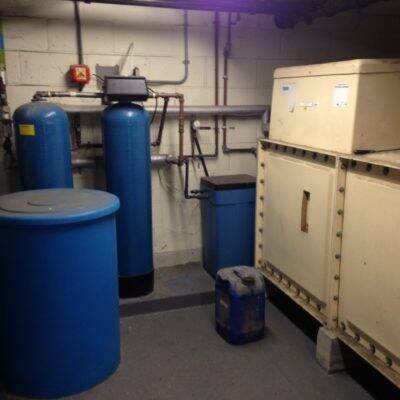 Image showing a large blue water softener system