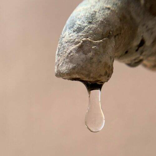 Tap covered in limescale