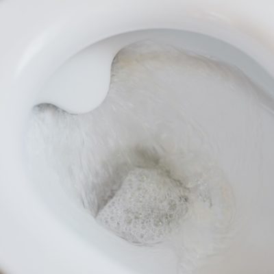 close up of a flushing toilet
